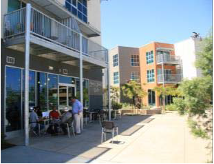 Storefront glazing and sidewalk-oriented entrances promote pedestrian comfort, convenience, and safety.