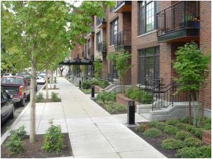 Direct entrances into individual ground-floor residential units ensure pedestrian comfort on less active streets.