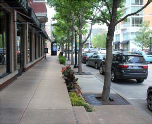 A raised sidewalk can allow for proper urban retail frontage, while still mitigating flood risk.