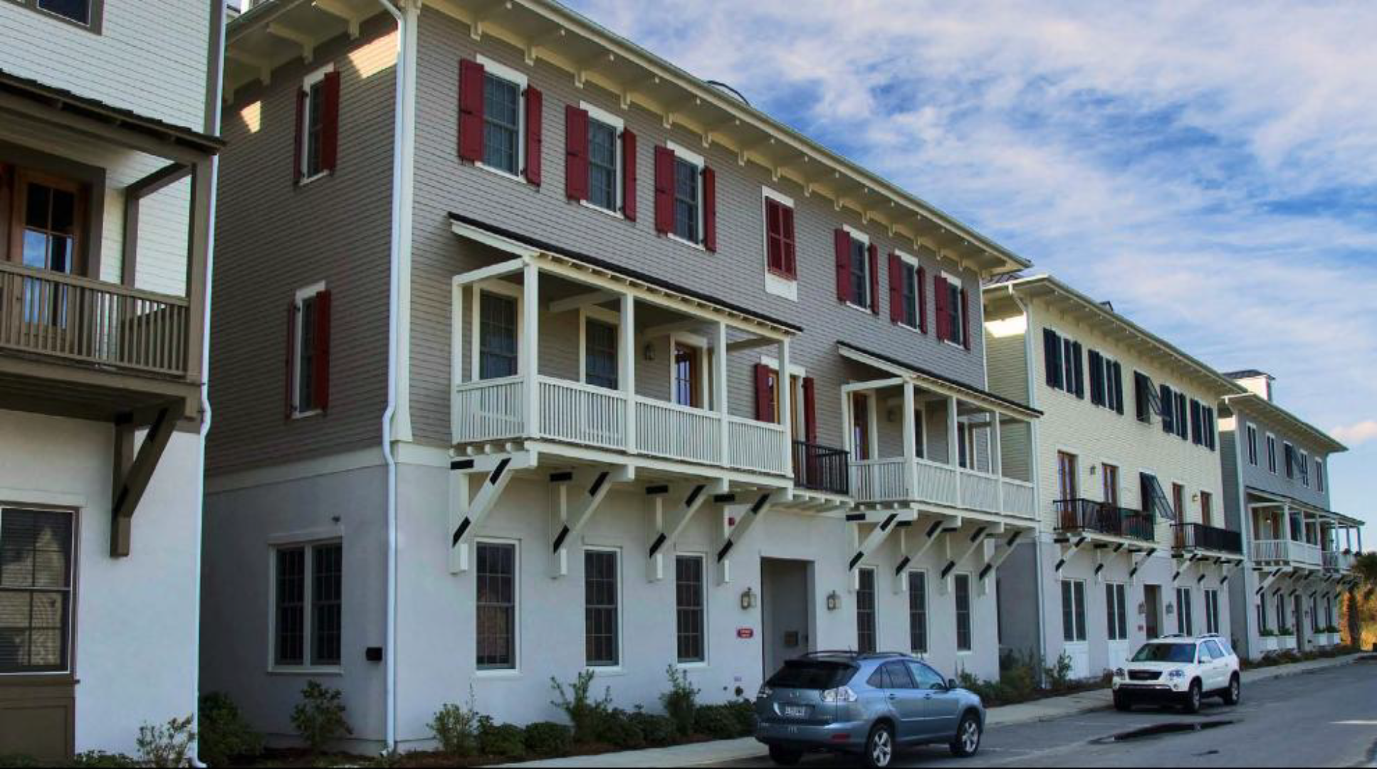 An apartment house with a recessed stoop