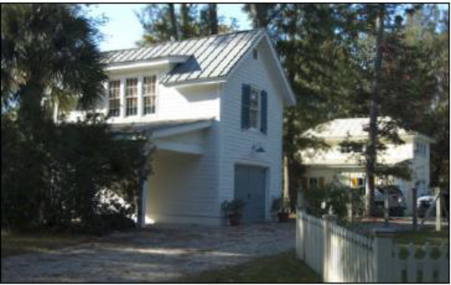 One-and-a-half-story carriage house with a carpet