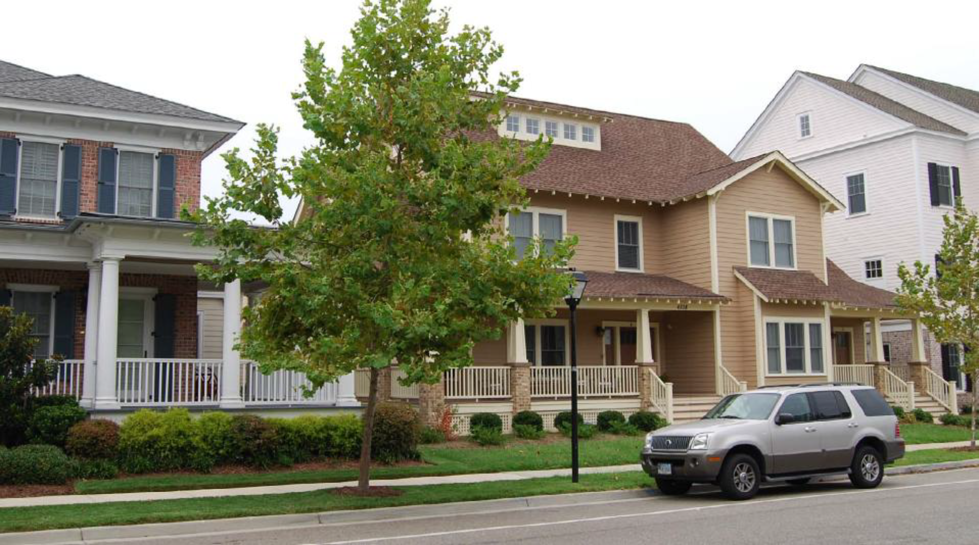 A side-by-side duplex with each unit having its own porch