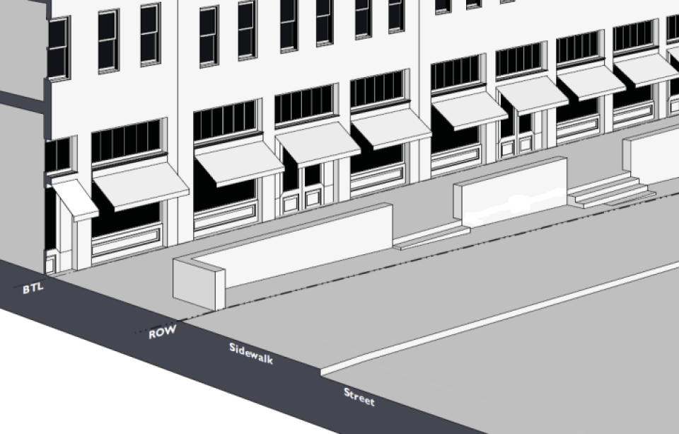 A terrace accommodating a change in grade along a series of shop fronts