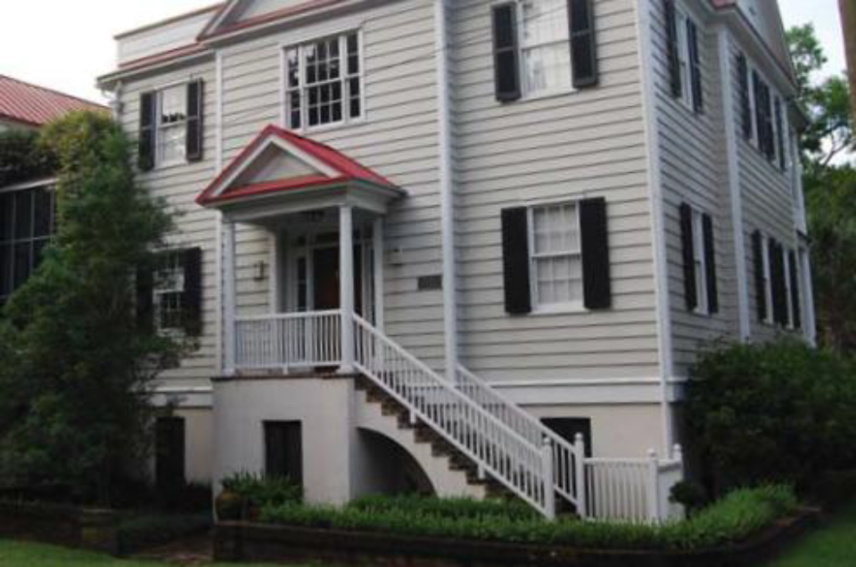 A raised stoop on a single-family dwelling