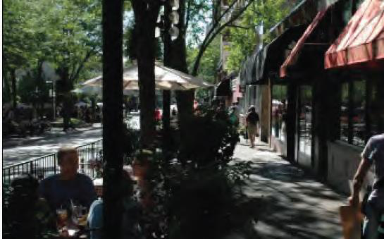 Image 20.225-10 Scaled Features Outdoor dining, awnings and architectural features contribute to a human-scaled streetscape.