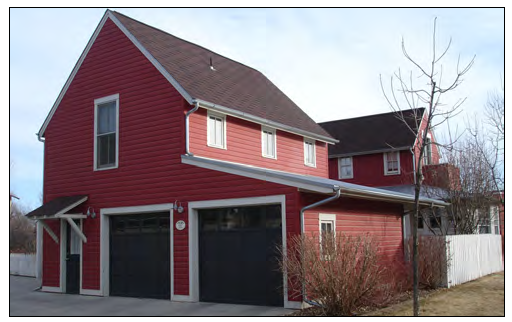 One-and-a-half-story carriage house with an internal stair.