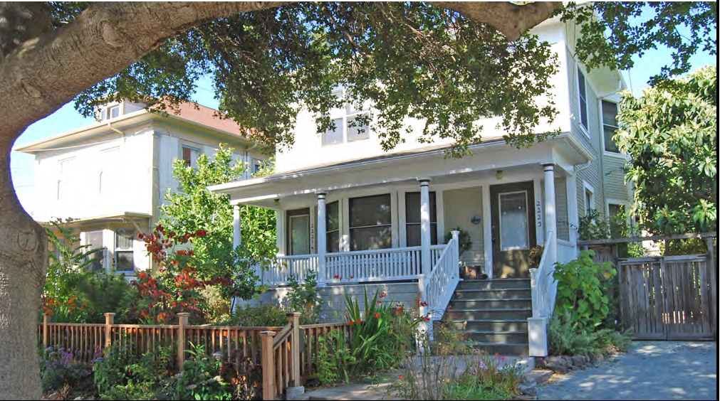 The difference in the form between this duplex and single-unit houses in the neighborhood is barely perceivable.