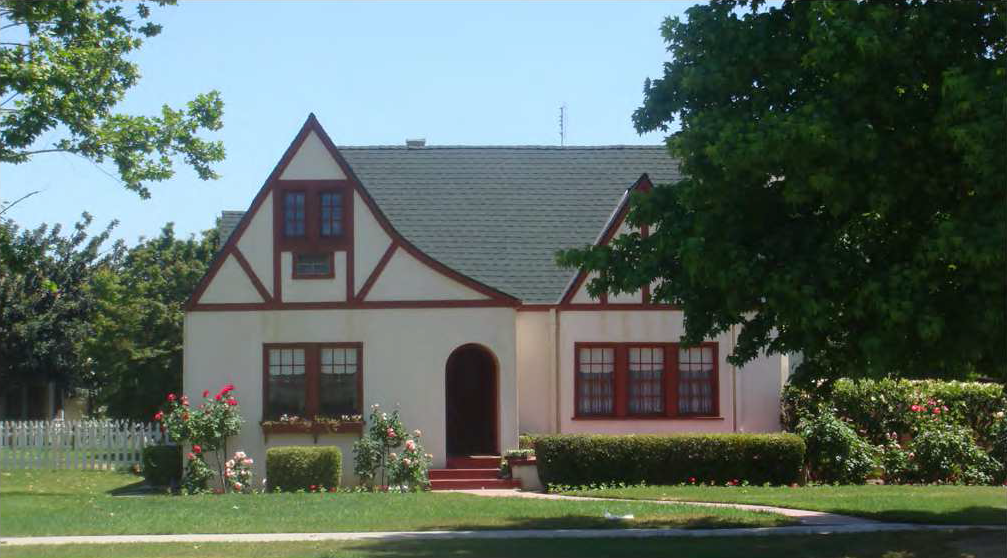 One-and-a-half-story front-loaded village house.