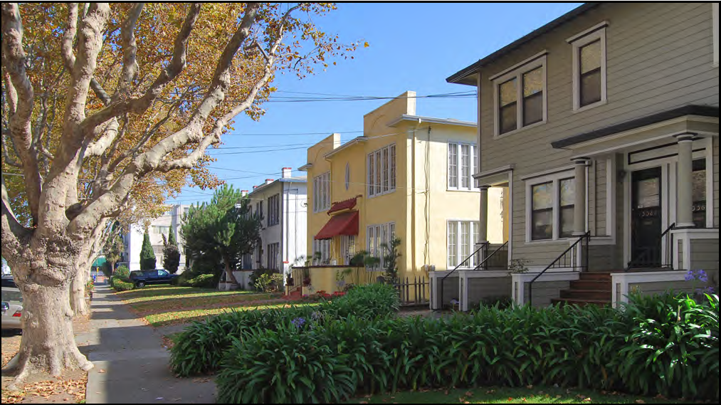 A group of apartment houses that have the scale and character of large single-family houses.