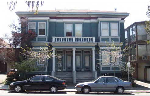 A mansion apartment with multiple entries along the front.