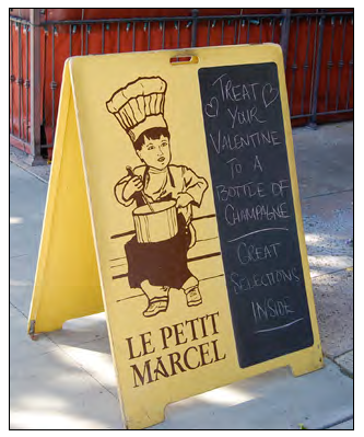 Wood and slate sidewalk sign.