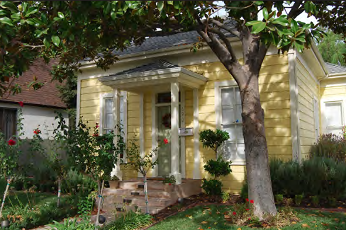 This stoop on a single-family dwelling with a medium setback engages the street.