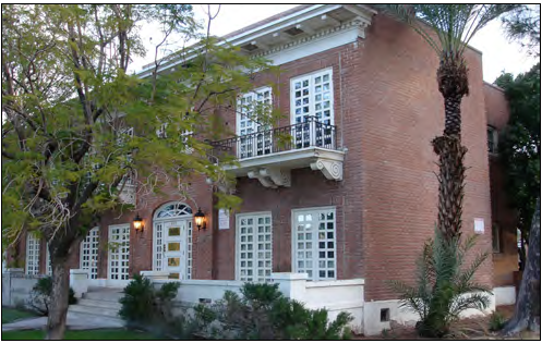 A series of townhouses which read as a single large building.