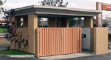 A separate pedesrian entry provides convenient access to trash and recycling receptacles.
