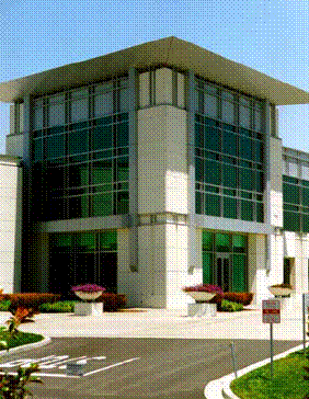The building's entry provides a quality focal point while tying into the overall mass and building composition.