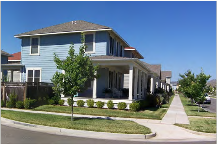 Example of a building that incorporates the same materials and finishes on both its primary street and side street façades. Its front porch also faces both streets.