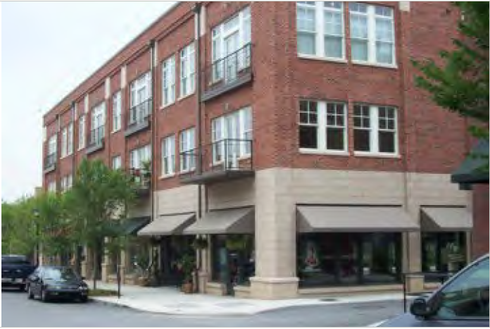 Example of a building that incorporates the same materials and finishes on both its primary street and side street façades. Its front porch also faces both streets.