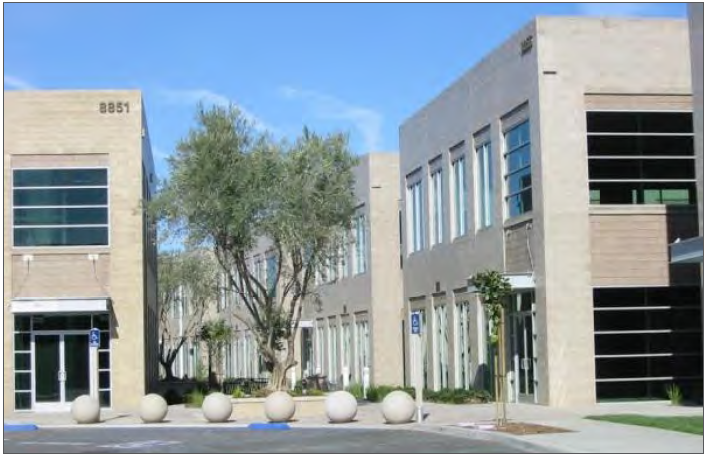 Example of an Industrial Building with a continuous band of street-facing windows.