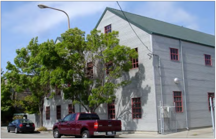 Example of an Industrial Building with a continuous band of street-facing windows.