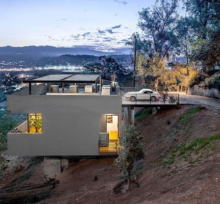 Exhibit 3. Building With Minimal Setback from the Street to Allow for Access and Parking; Pier Supported Structures Tend to Jut From Slopes Rather Than Blend With Slopes