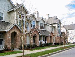 Figure 8. Desirable Townhouse Example With units fronting on the street and garages placed to the rear accessible from an alley or shared driveway.