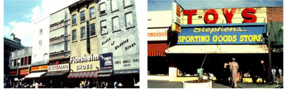 Figure 7. Unacceptable Wall Sign Examples These signs are out of scale with the facades and appear to cover over historical architectural features.